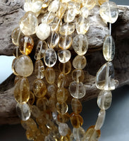 Citrine oval bead strand