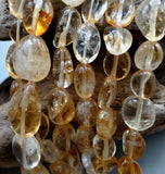 Citrine oval bead strand