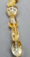 Citrine oval bead strand