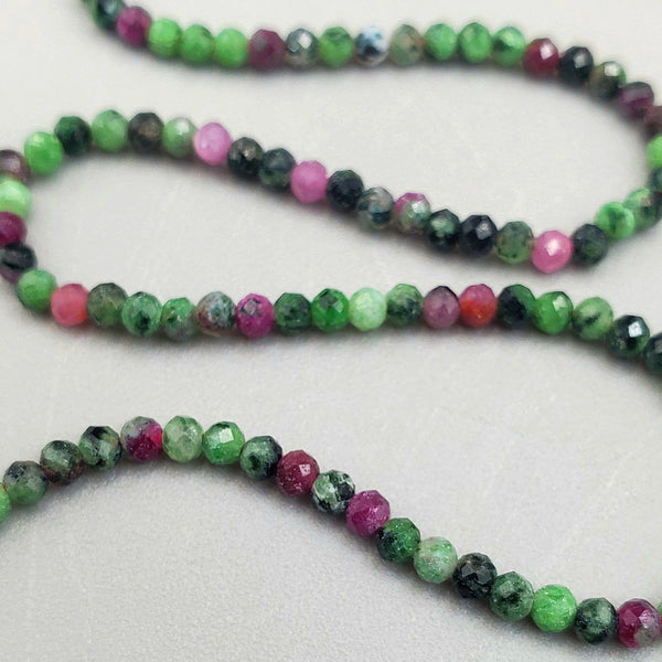 Faceted Ruby In Zoisite Micro Bead Strand