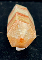 Red Calcite Tower Carving